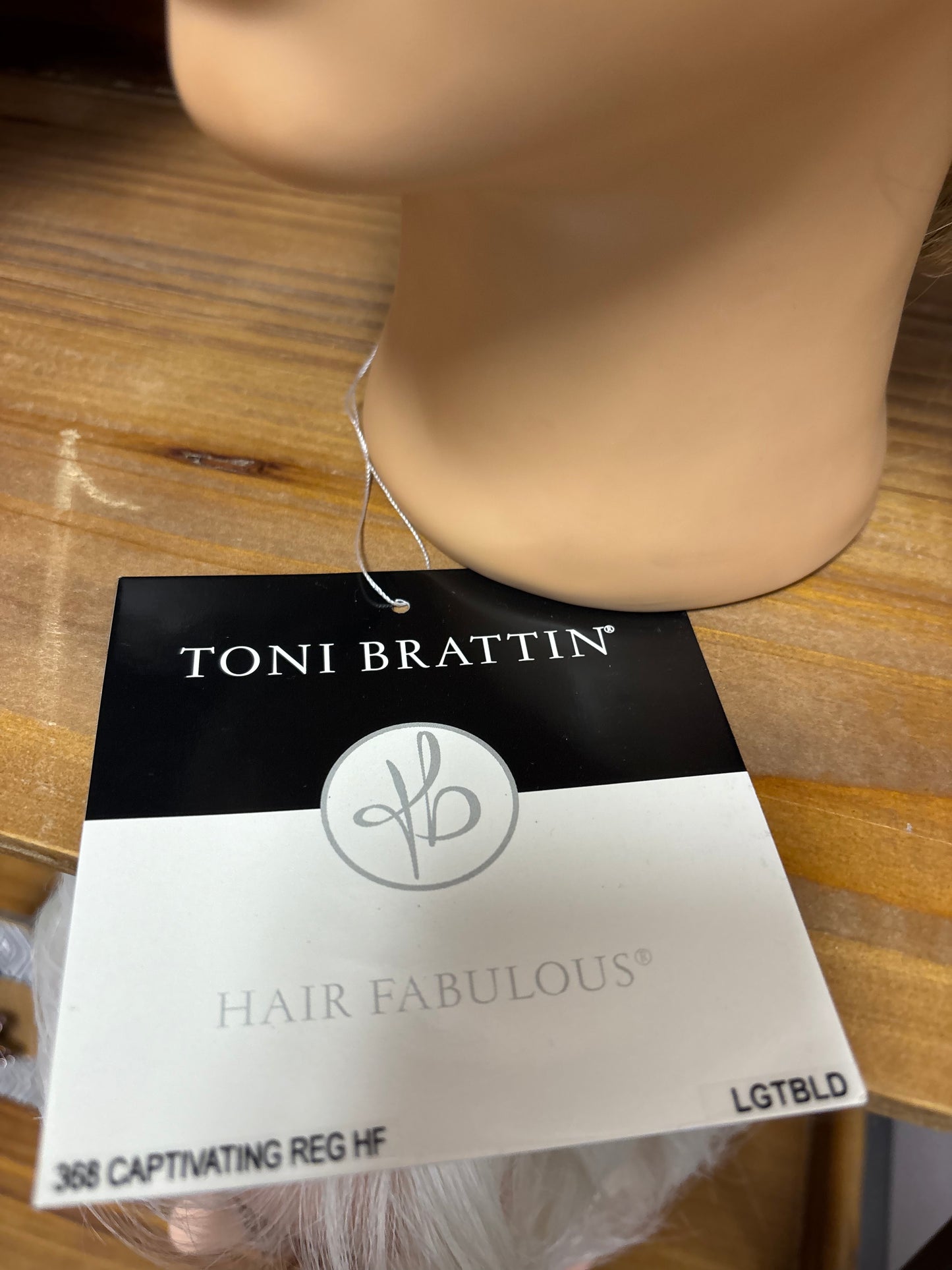 Captivating by Toni Brattin – BOUTIQUE DEAL