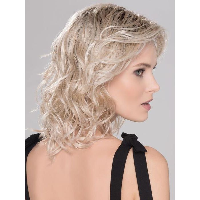 The sides and back have open wefting to keep you cool and comfortable all day long. There is a temple to temple lace front hairline providing a natural look even if you lift your bangs up and a mono part