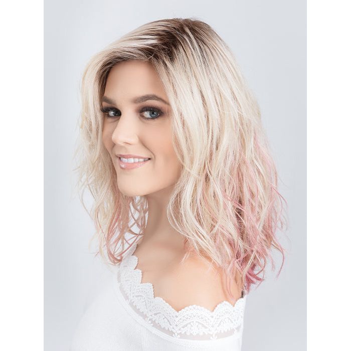 TABU by ELLEN WILLE in ROSE BLONDE ROOTED | Medium Dark Brown Roots that melt into a Pale Golden Blonde with a Mixture of Pink Tones Underneath with Dark Roots
